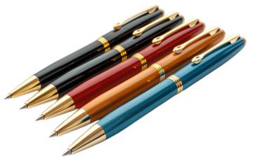 Colorful pens in a rainbow of colors splay across a white desk, ready for drawing and design