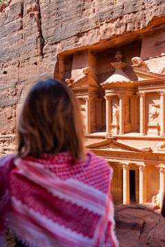 Woman Admiring Ancient Petra's treasure, travel Jordan