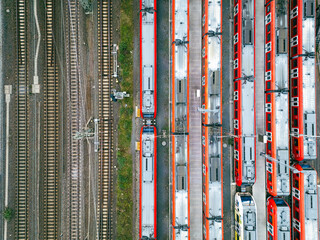 top down view of red trains and the railroad 