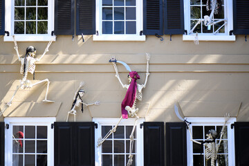 A House Decorated For Halloween With Skeletons