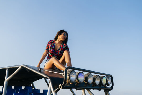 Woman posing on a buggy