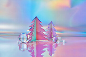 Christmas trees from holographic foil and glass baubles in studio