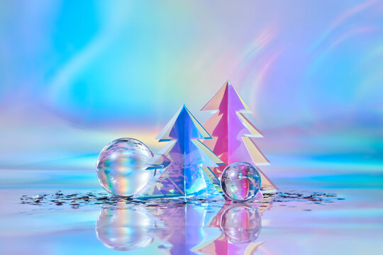 Glass baubles, confetti and Christmas trees made of holographic foil
