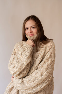 Woman wearing oversize jumper 