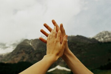 Romantic photo of hands touching