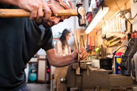 Working together at industrial workshop