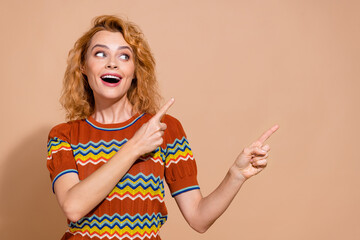 Photo of ecstatic woman dressed ornament t-shirt indicating staring at awesome sale empty space isolated on pastel color background