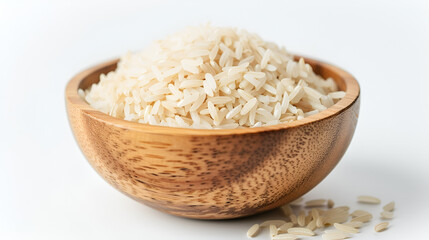 Wooden bowl filled with white rice, a staple food, on a white background