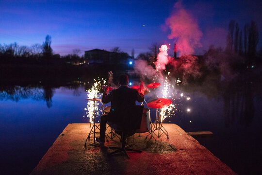 Cool Drummer Playing With Fireworks Instead Drumsticks