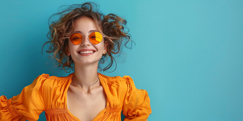 In a bright studio portrait, a fashionable young woman exudes positivity and beauty, complemented by trendy sunglasses and a radiant smile.