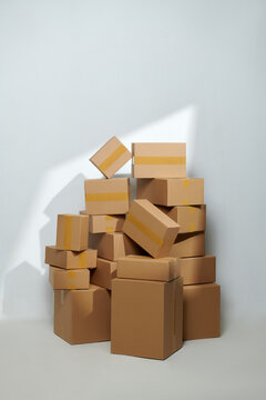 Cardboard boxes with stuff indoors. Moving day