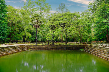 Baphuon Temple with its sacred pool - 11th century Shiva temple built by Suryavarman I, built in...