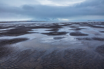 Floodplain at the mouth of the river Heradsvotn at low tide, north Iceland