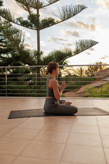Obraz na płótnie Canvas yoga at the terrace Spain