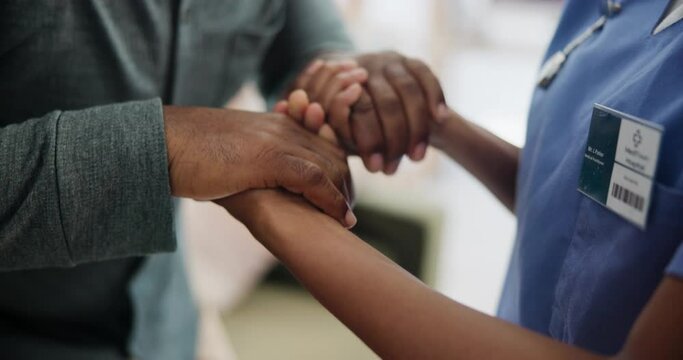 Nurse, holding hands and old man or walking help for physical therapy in rehabilitation, healthcare or support. Person with a disability, fingers and caregiver for stranding balance, aid or recovery