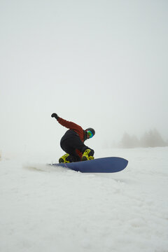 Snowboarder in a sharp turn