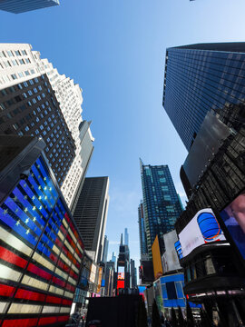 Times Square skyscrapers with digital American flag