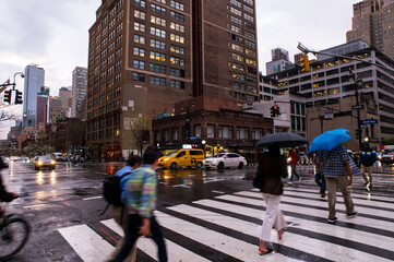 Manhattan intersection with walking pedestrians