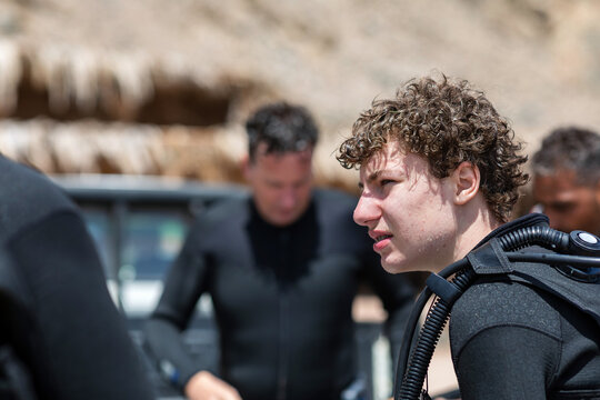 Portrait of a curly boy Scuba Diver