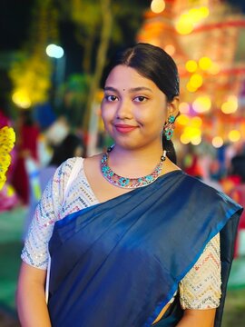 Portrait of an Indian teenage girl wearing traditional sari dress
