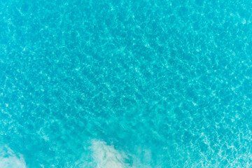 Brilliant crystal clear turquoise ocean with white sandy ocean floor