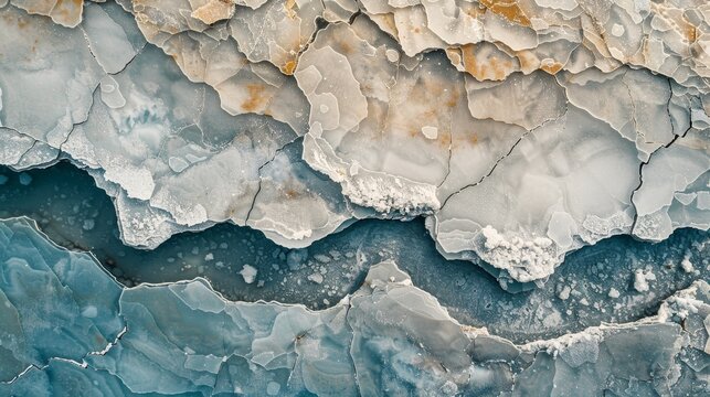 A rocky cliff with a blue and white color scheme. The image has a cold and desolate feeling to it