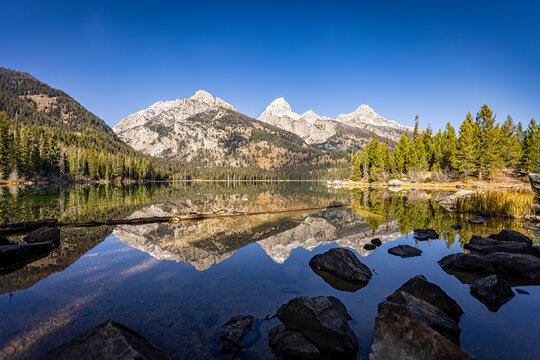 Taggart Lake Reflecting the Teton Mountains in Wyoming