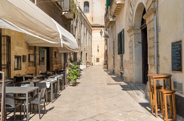 Fototapeta na wymiar Pedestrian area in the historic center of Lecce town in Salento in Puglia, Italy