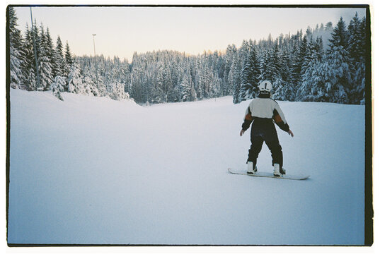 Woman snowboarding