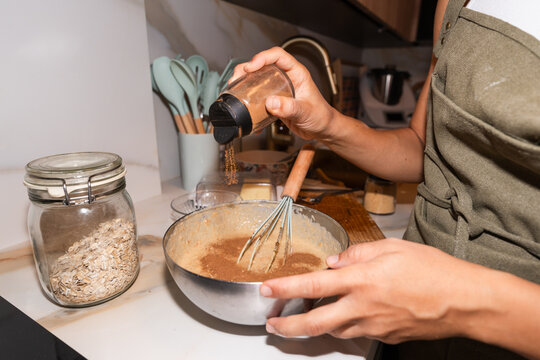 woman preparing a healthy sponge cake