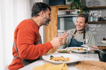 Couple Sharing a Joyful Meal Together