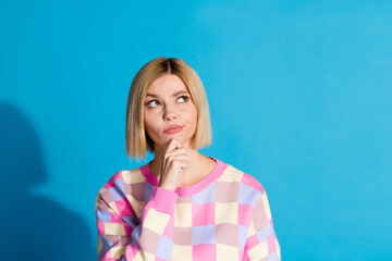 Photo of intelligent woman with bob hairdo dressed colorful sweater look empty space think business...