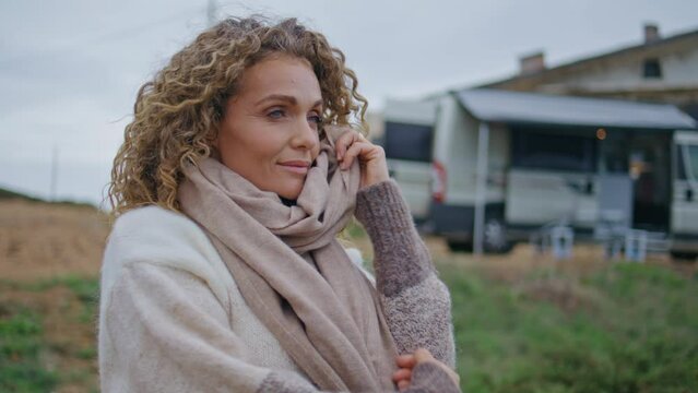 Beautiful woman posing camping park gloomy spring morning close up. 
