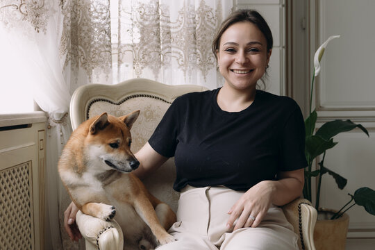 Portrait of Woman With A Dog