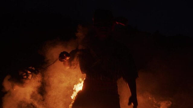 Indigenous Shaman Dancing around the Bonfire