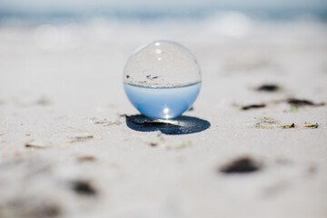 lens ball on beach
