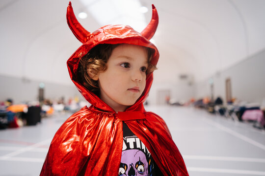 Kid in devil costume on Halloween