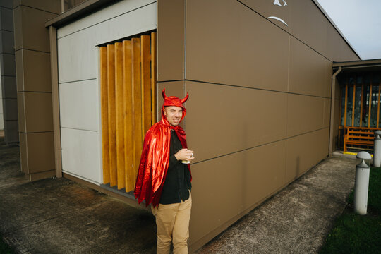 Man in red devil costume 