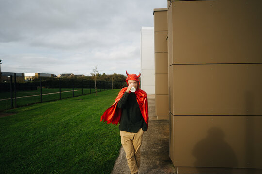 Man in devil costume on Halloween party