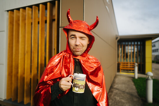 Man in devil costume on Halloween party