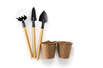 A shovel and a rake for transplanting seeds of agricultural plants. garden tools shovel, shovel,...