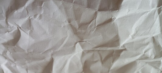 wrinkled crumpled  white paper background
