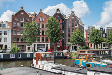 Canal houses and houseboats in the center of Amsterdam.