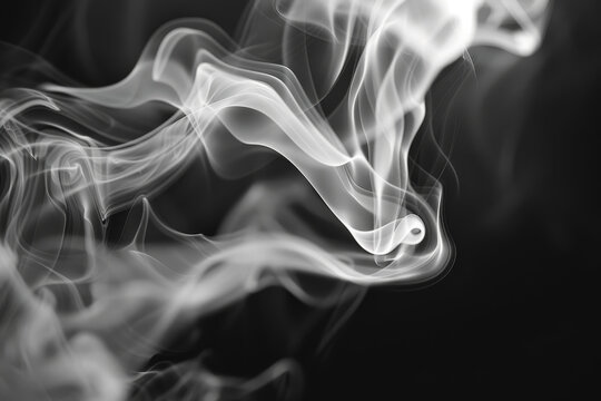 A black and white photo of smoke, with the smoke being white