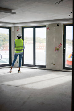 Woman engineer inspecting constraction site
