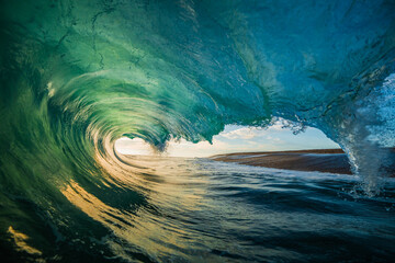 Ocean wave at sunset 