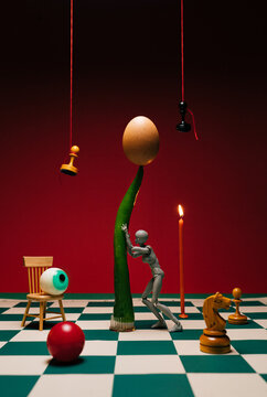 Conceptual still life on a chessboard.