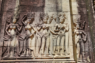 Apsara - Stone bas relief depicting Heavenly nymphs and celestial dancers at the courts of the...