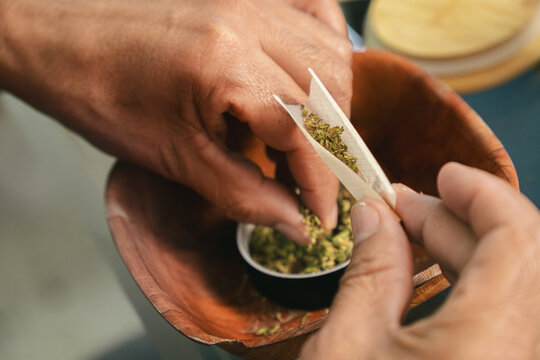 Man rolling a joint