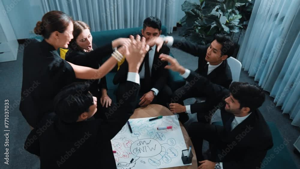 Poster top view of business people putting hands together and clapping hands to celebrate successful projec